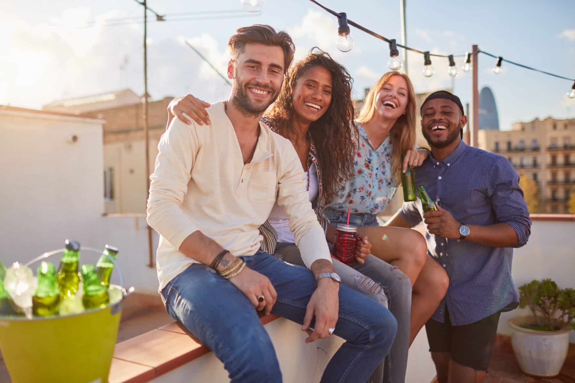 Roof garden party in Barcelona, young people celebrating. Roof garden party in Barcelona, young people celebrating.
