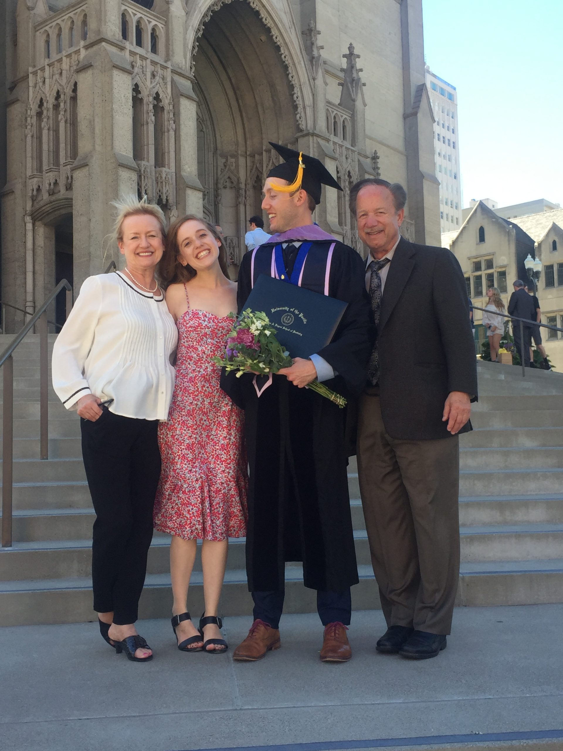 Dr. Gluskin with wife, Riitta; daughter, Suvi; and Adam at Adam’s dental school graduation