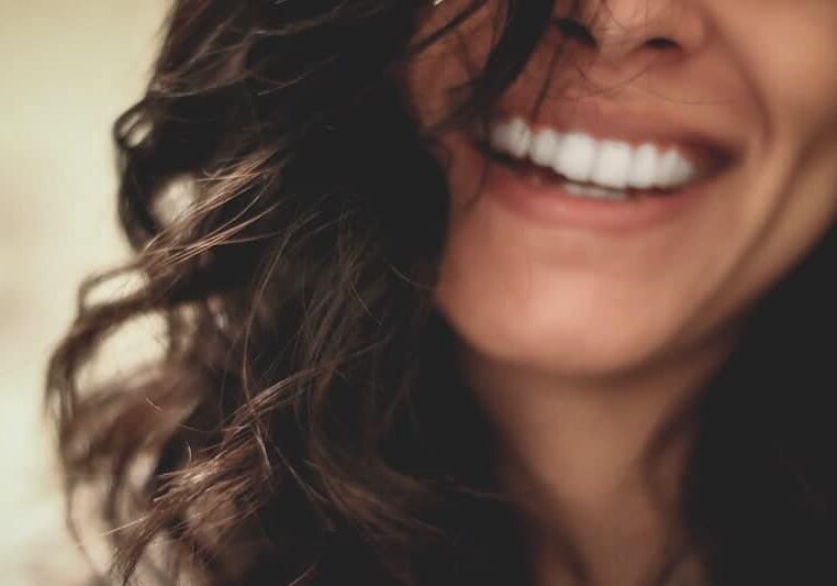 A smiling woman with amazing teeth